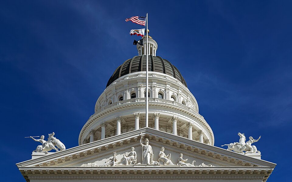 Northwest view up to the pediment, rotunda, and dome of the California State Capitol in Sacramento