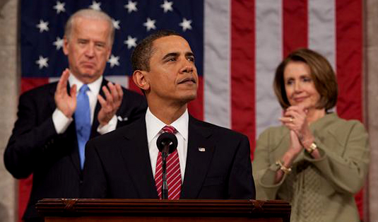 Barack Obama looks on during a joint session of Congress (State of the Union-like) on the night of F
