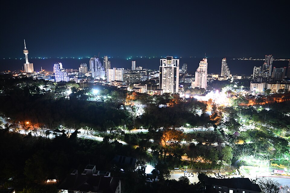 This is a stunning nighttime panorama of Pattaya City in Thailand. The photo captures an elevated vi