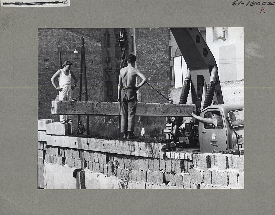 Oct. 13, 1961. East German construction workers raise the height of the Berlin Wall to further obstruct views from the West.  From the booklet "A City Torn Apart: Building of the Berlin Wall." For more information, visit CIA's Historical Collections webpage (www.cia.gov/library/publications/historic