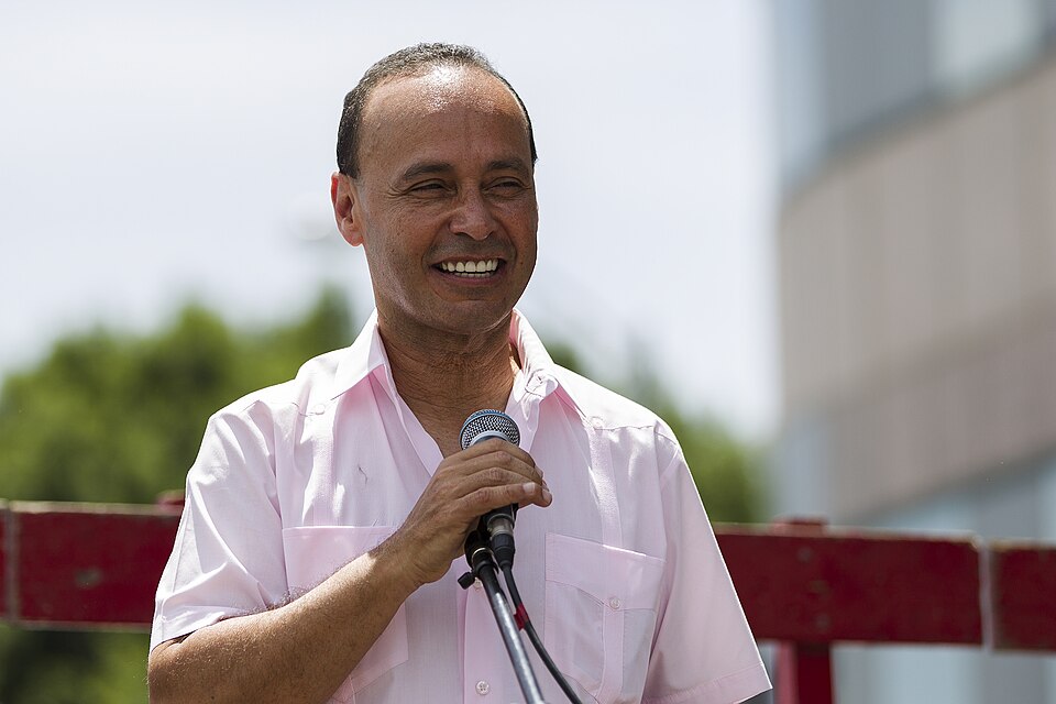 Illinois Representative Luis Gutierrez speaks to a crowd of demonstrators, pledging to fight for imm