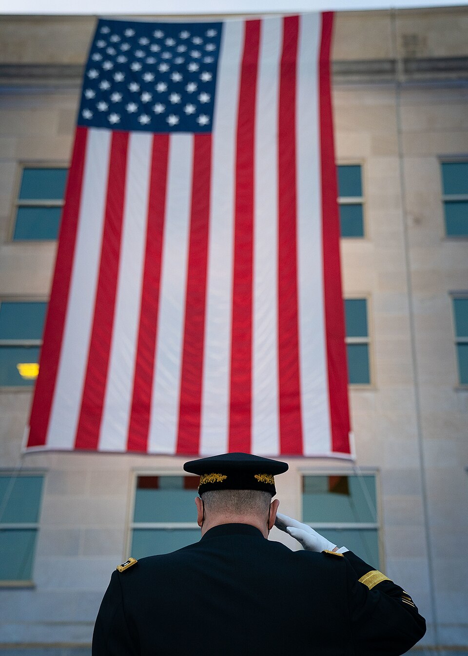 Army Gen. Mark A. Milley, chairman of the Joint Chiefs of Staff, attends a sunrise flag unfurling ce