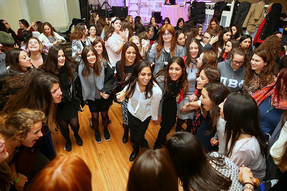Students dance following a havdalah ceremony, a ritual that separates the Sabbath from the rest of t