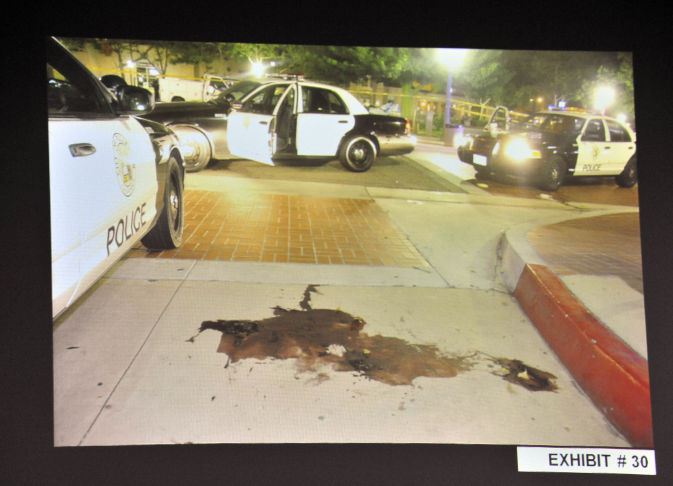 Kelly Thomas murder trial exhibit photo of the crime scene showing the victim's pool of blood.

Othe