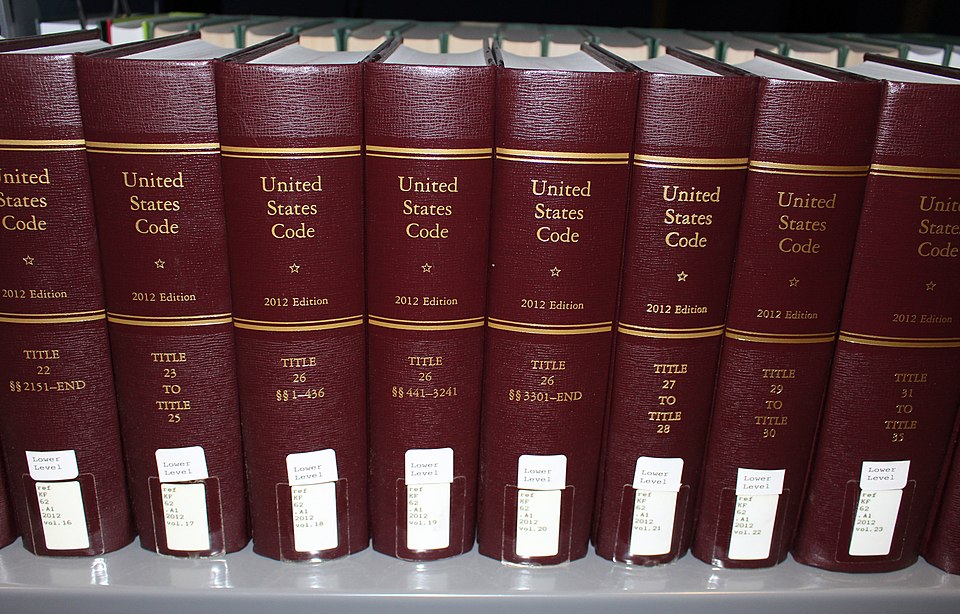 Volumes of the 2012 official edition of the United States Code in a public library in San Jose, Cali