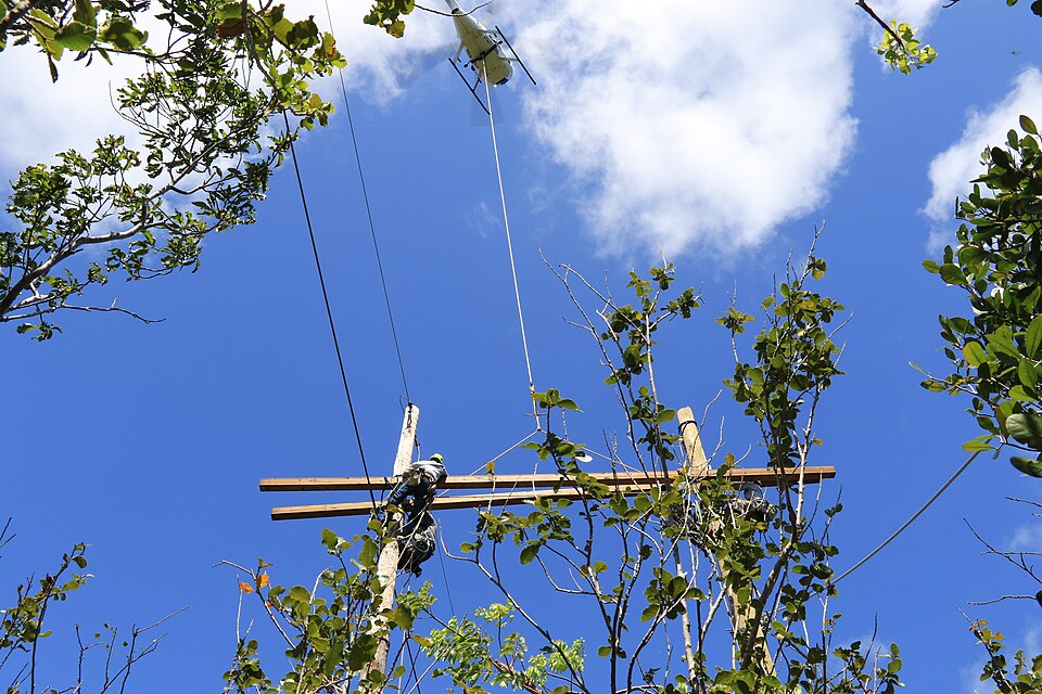 U.S. Army Corps of Engineers Task Force Power Restoration contractors complete work on a transmissio