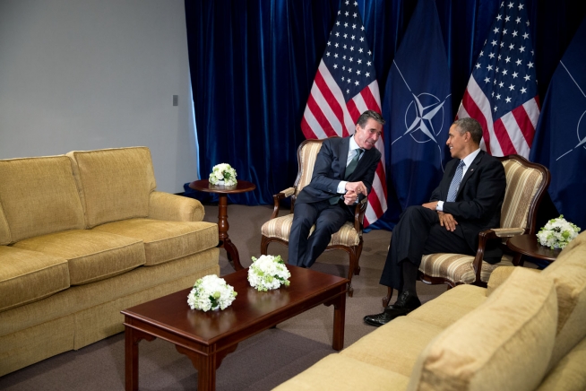 President Barack Obama talks with NATO Secretary General Anders Fogh Rasmussen following their bilat
