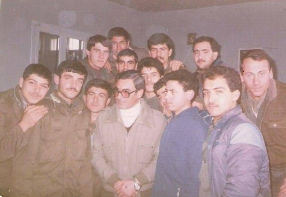 A teacher and his students in a classroom at a high school in Salamiyah, Ba'athist Syria, 1980s