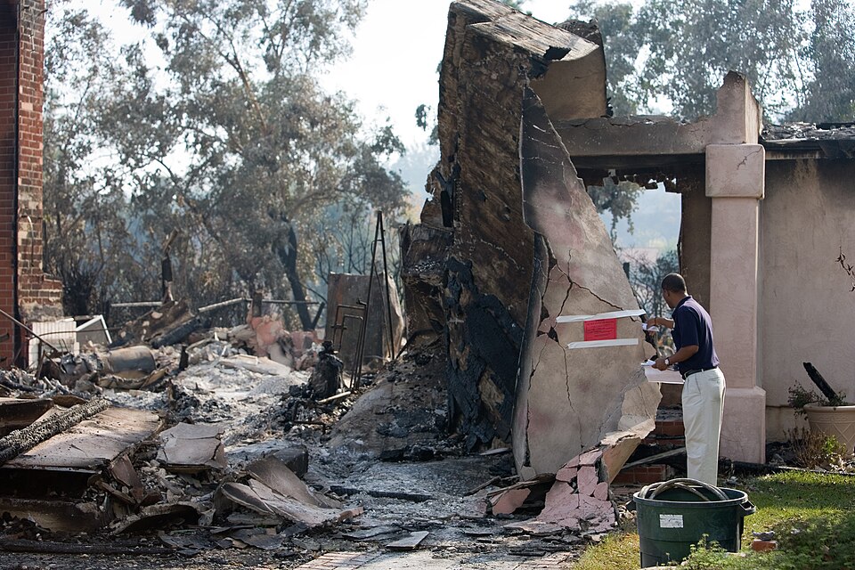 Rancho Bernardo, CA, October 28, 2007 -- A FEMA Community Relations specialist walks through a Ranch