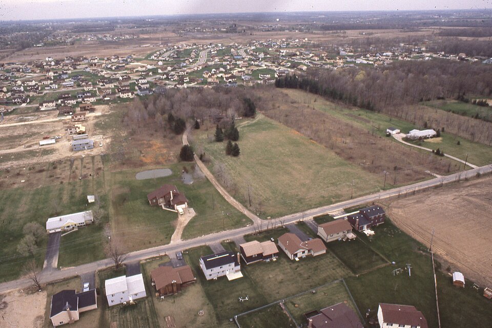 An aerial view looking south of the Olde Sawmill neighborhood including portions of what would becom
