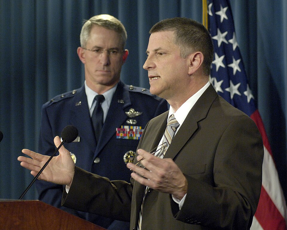 Principal Deputy Under Secretary of Defense for Personnel and Readiness Michael Dominguez (right) co