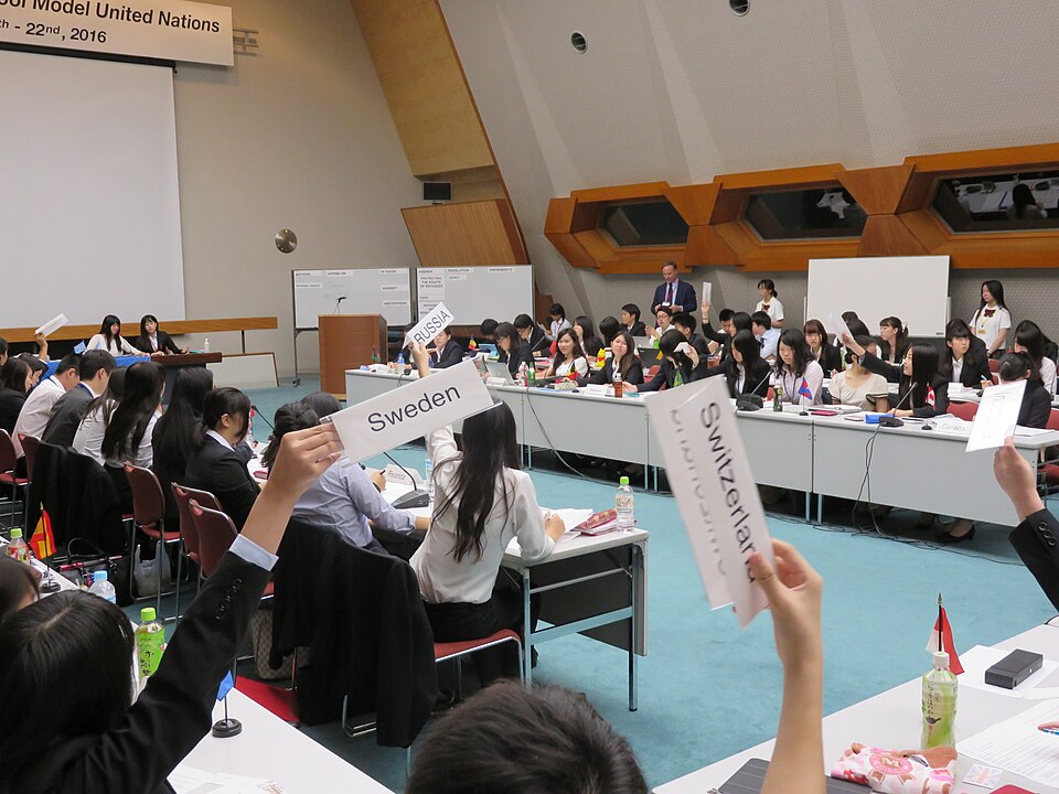 Voting by delegations during a General Assembly session at the 2016 Kansai High School Model United 