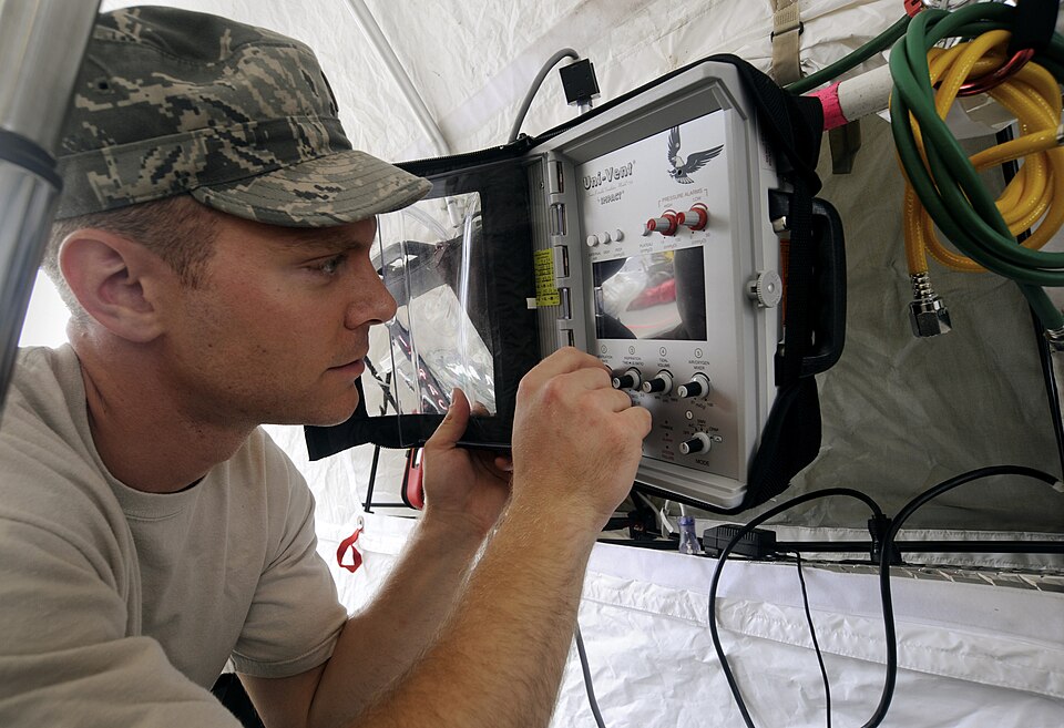 Oregon Air National Guard 2nd Lt. Joel Larson inspects medical equipment during the Oregon National 