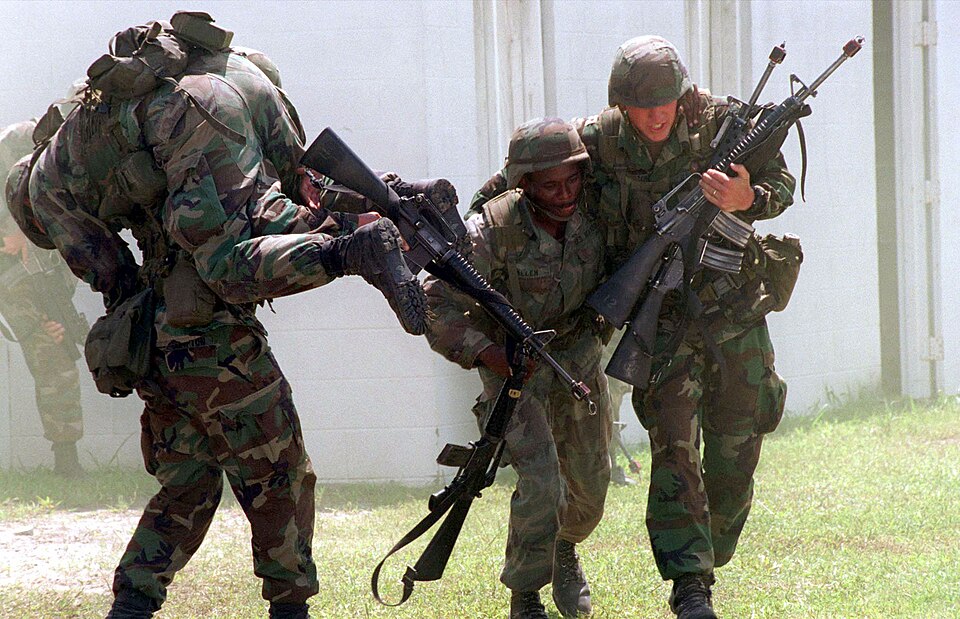 The original finding aid described this photograph as: [Complete] Scene Caption: US Marines armed wi
