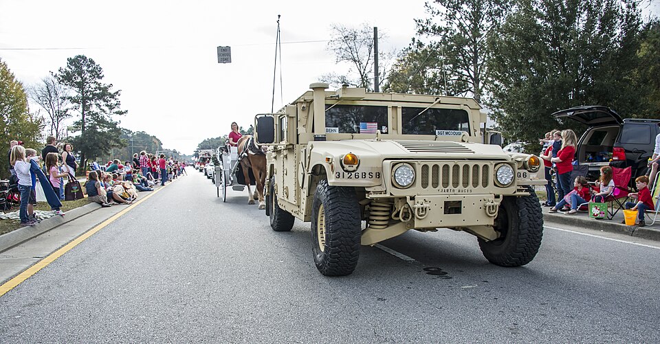 A High-Mobility Multipurpose Wheeled Vehicle driven by Soldiers assigned to the 26th Brigade Support